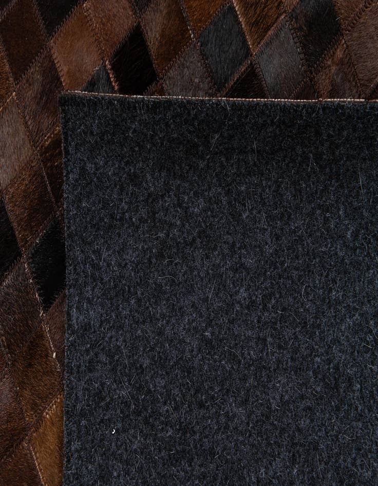 Detail image of 5' 11 x 9' Cowhide Stocks Rug