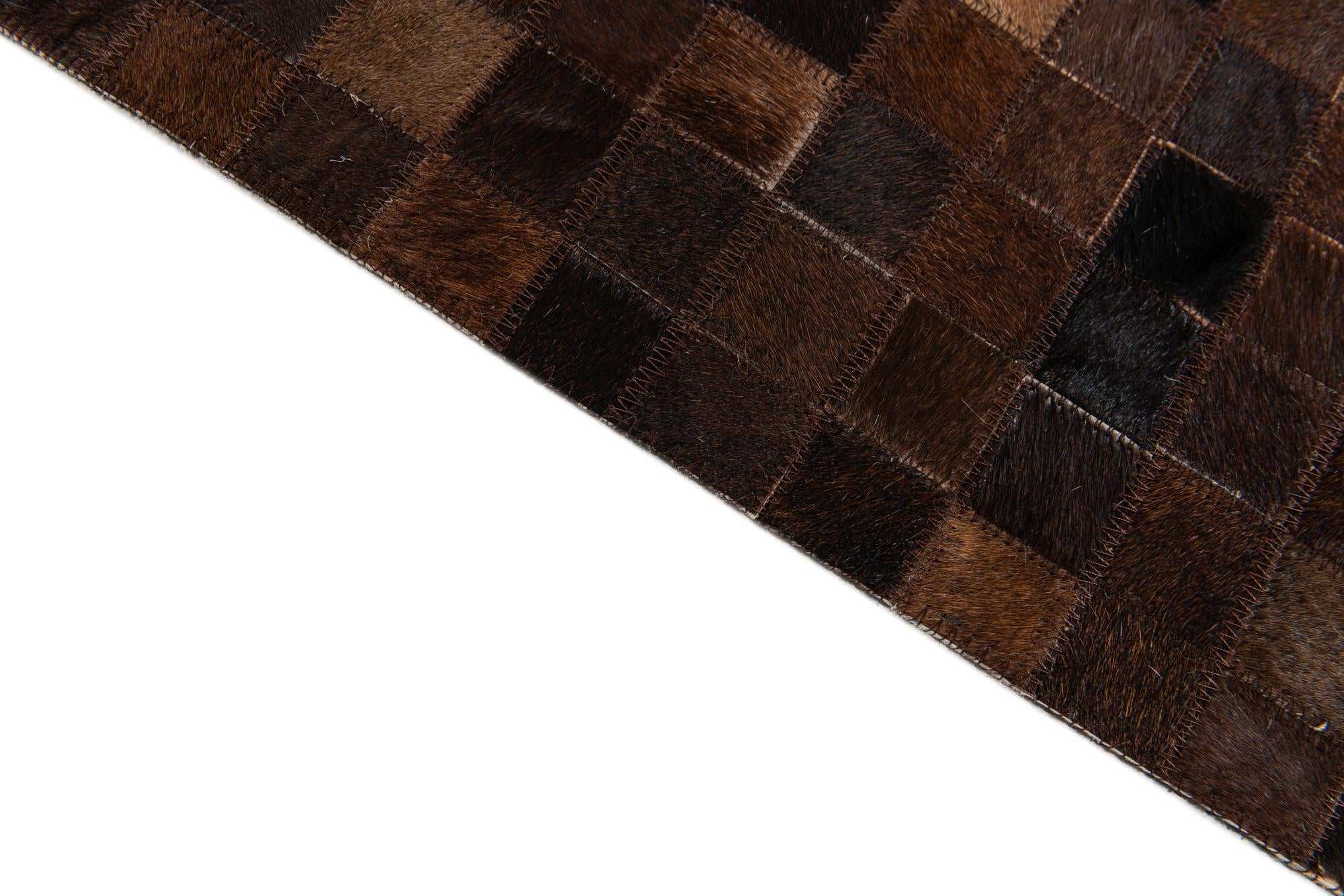 5' 11 x 9' Cowhide Stocks Rug
