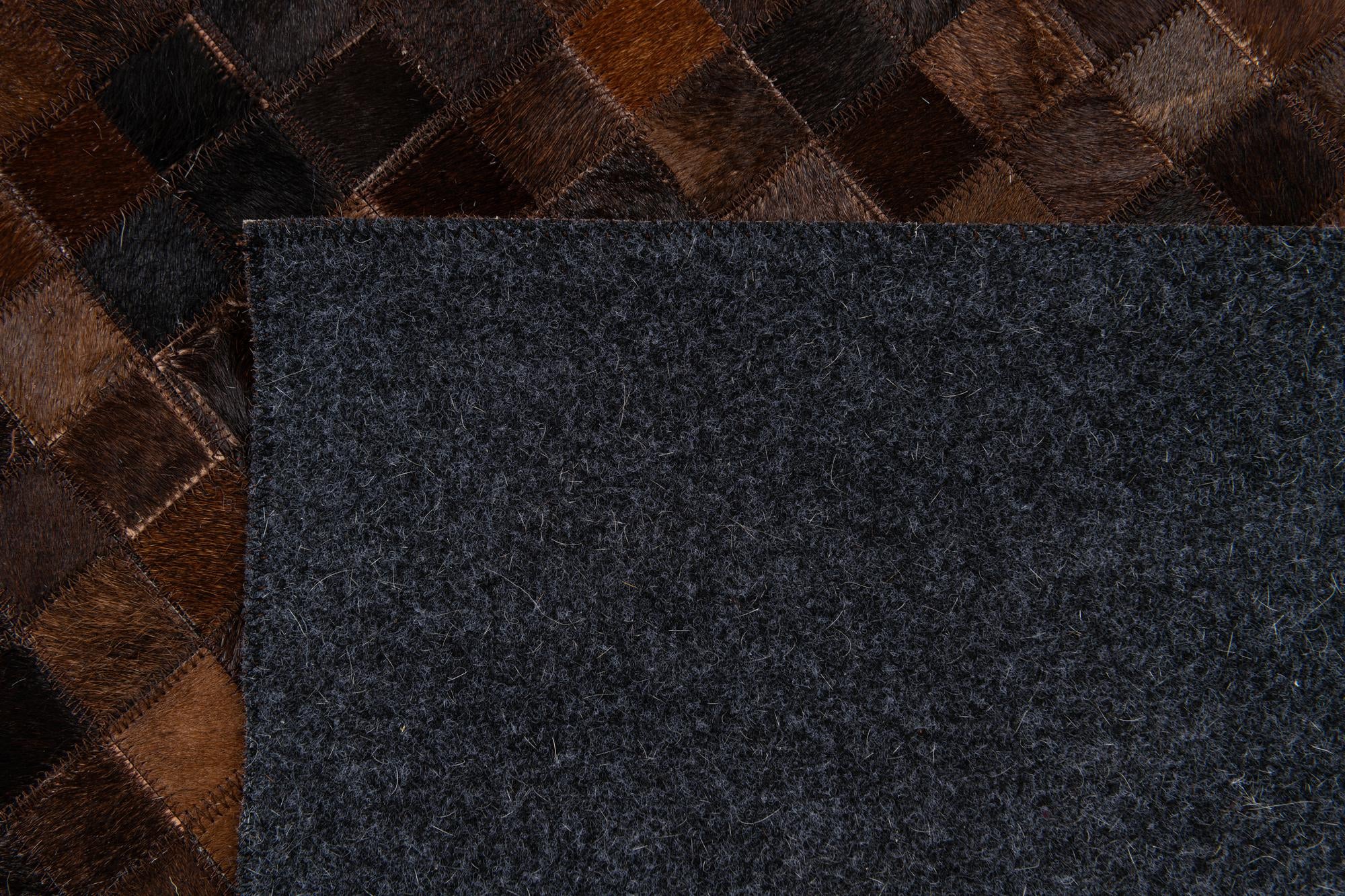 5' 11 x 9' Cowhide Stocks Rug
