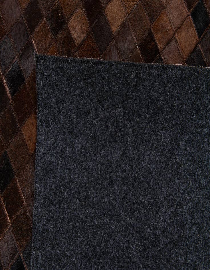 Detail image of 5' 11 x 8' 11 Cowhide Stocks Rug