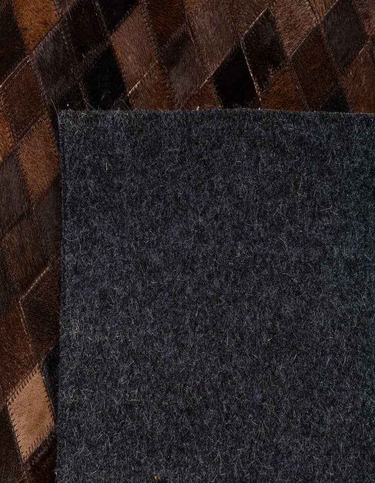 Detail image of 5' 11 x 8' 11 Cowhide Stocks Rug