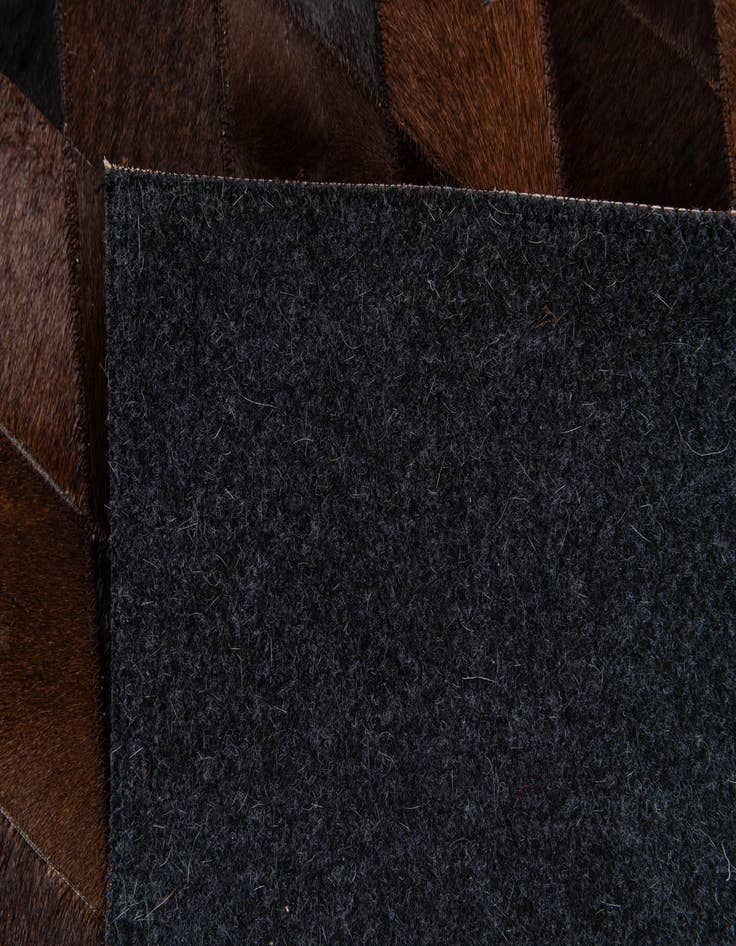 Detail image of 6' 6 x 9' 9 Cowhide Stocks Rug
