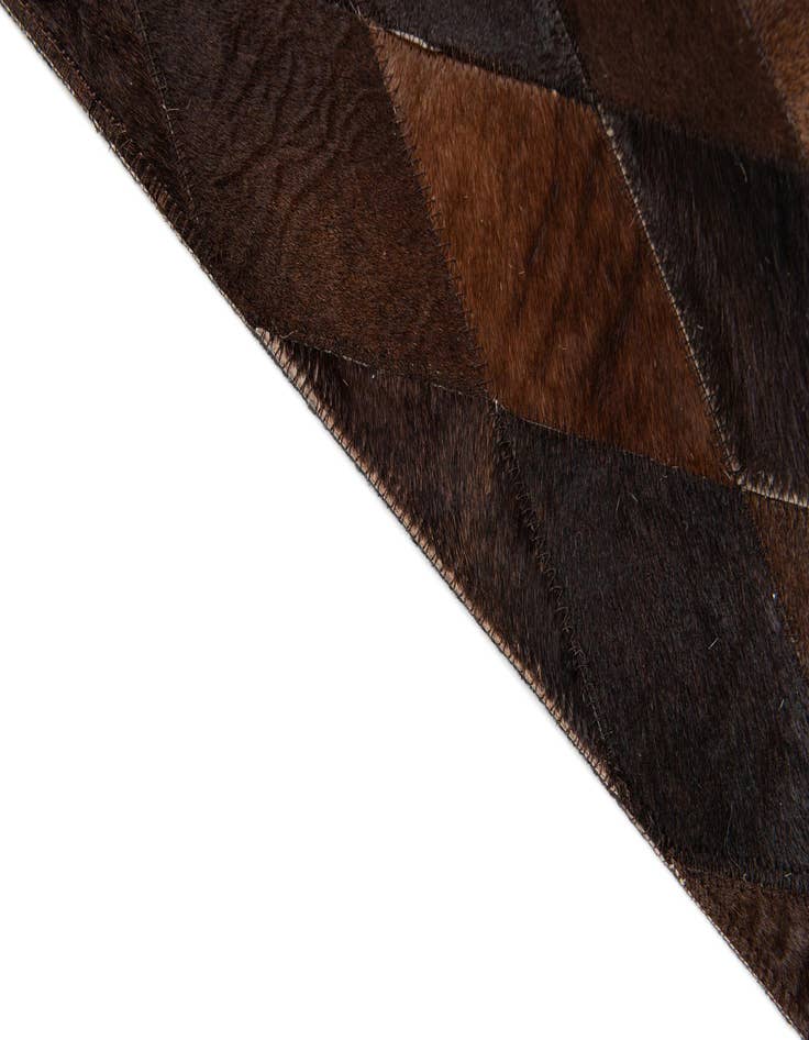 Detail image of 6' 7 x 9' 10 Cowhide Stocks Rug