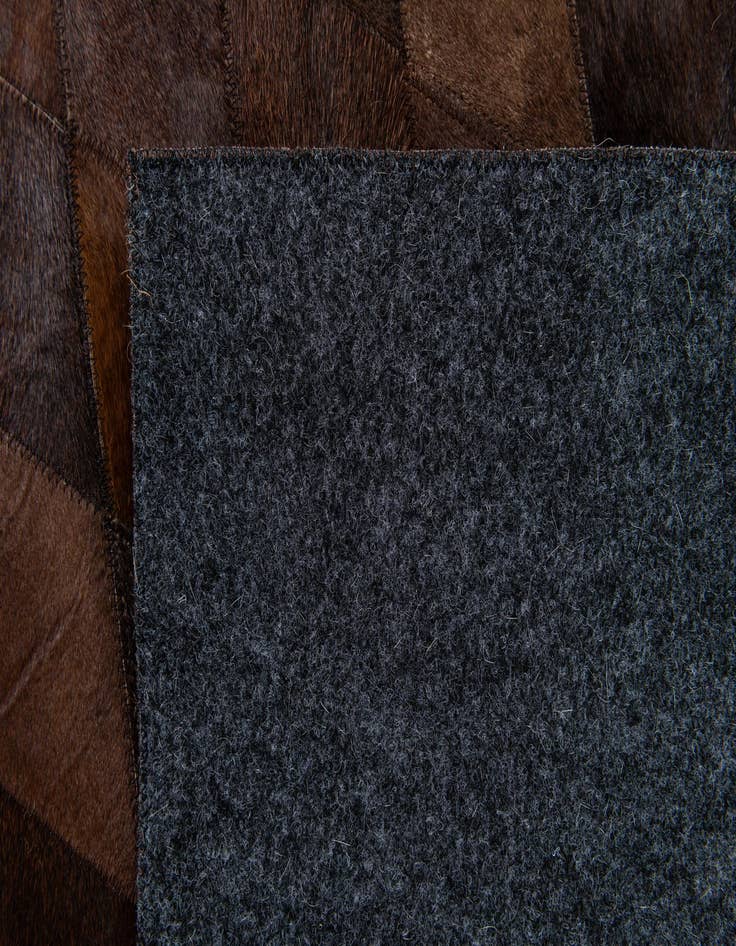 Detail image of 6' 7 x 9' 10 Cowhide Stocks Rug