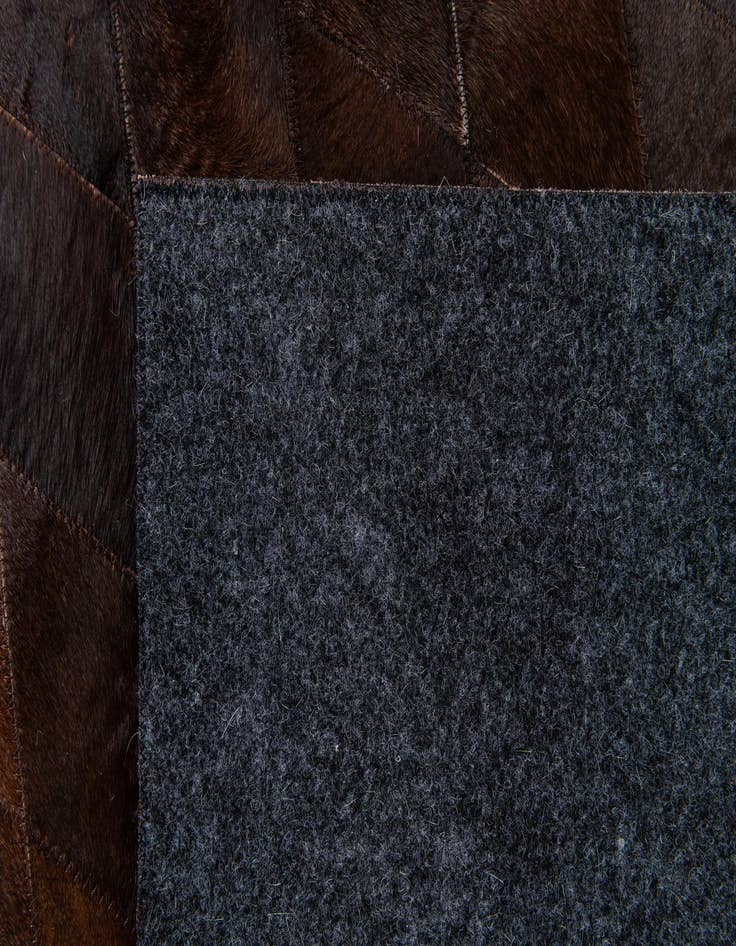 Detail image of 6' 7 x 9' 10 Cowhide Stocks Rug