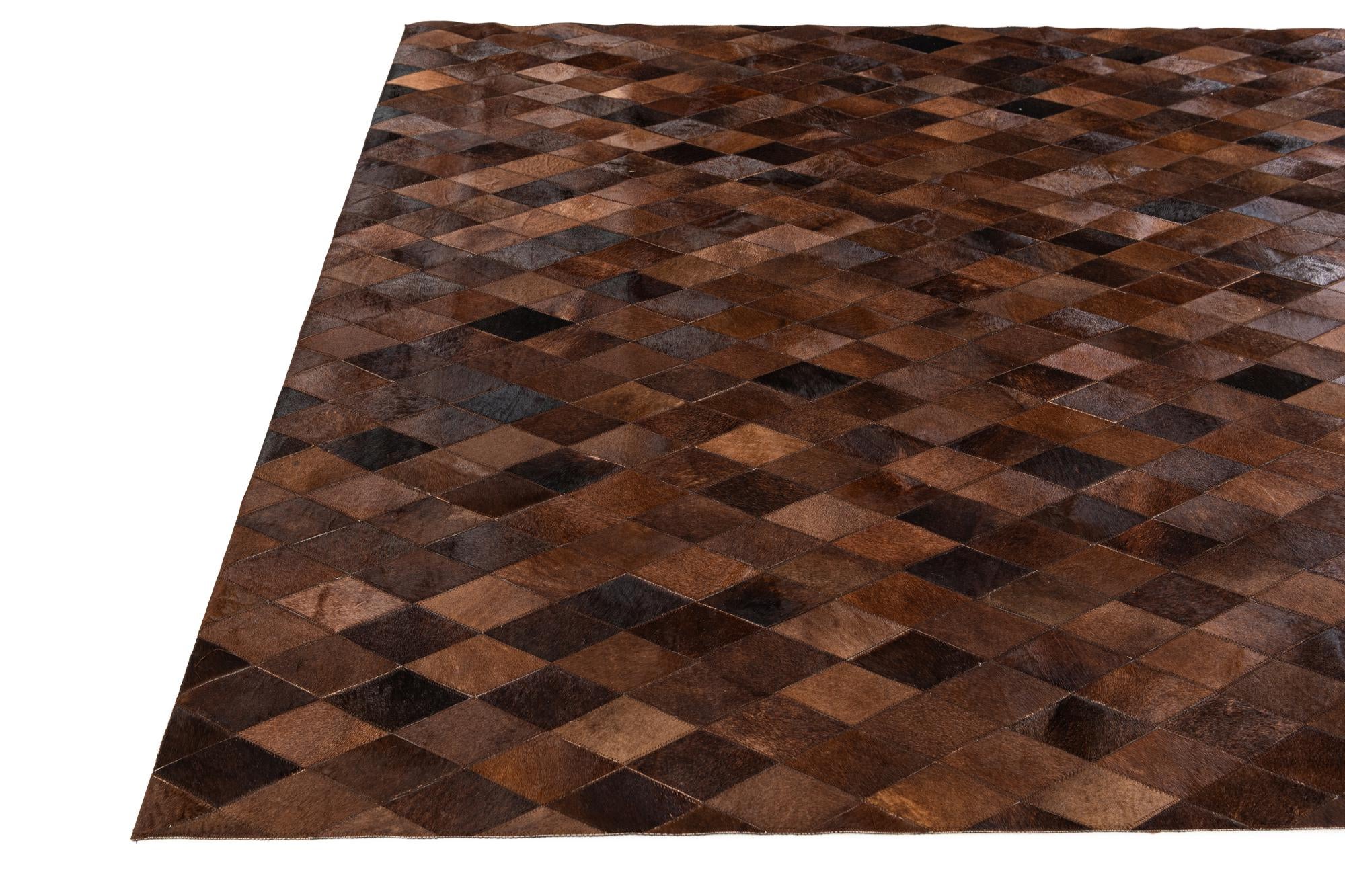 6' 7 x 9' 10 Cowhide Stocks Rug