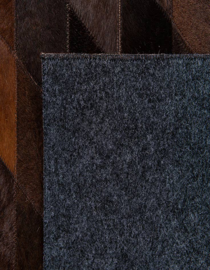 Detail image of 6' 6 x 9' 10 Cowhide Stocks Rug