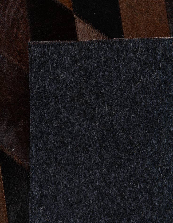 Detail image of 6' 6 x 9' 11 Cowhide Stocks Rug
