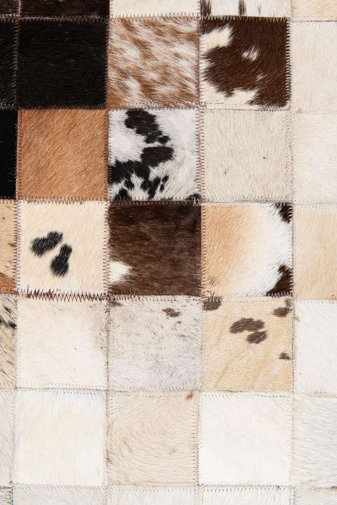 5' x 7' 11 Cowhide Stocks Rug