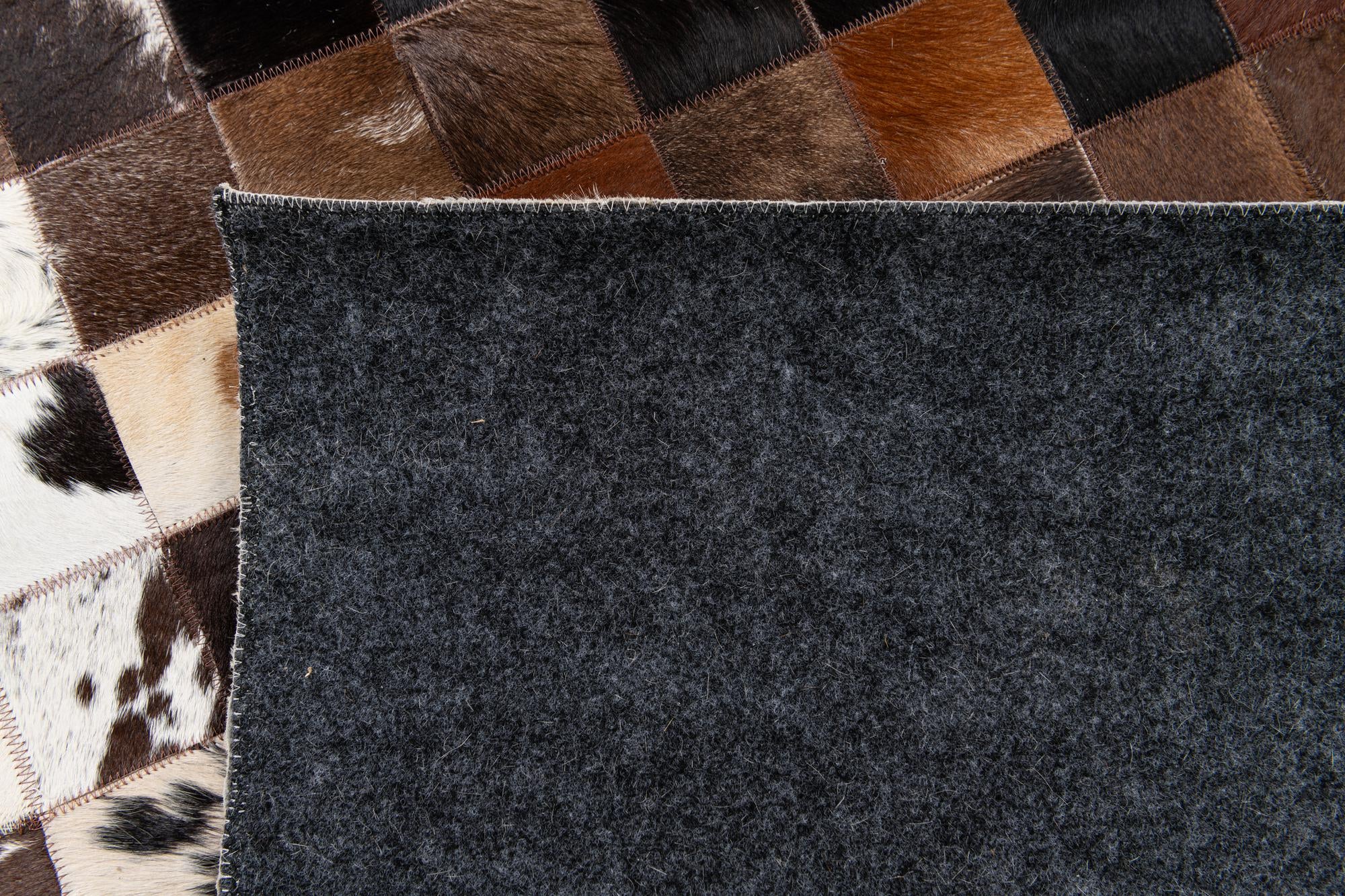 5' x 7' 11 Cowhide Stocks Rug