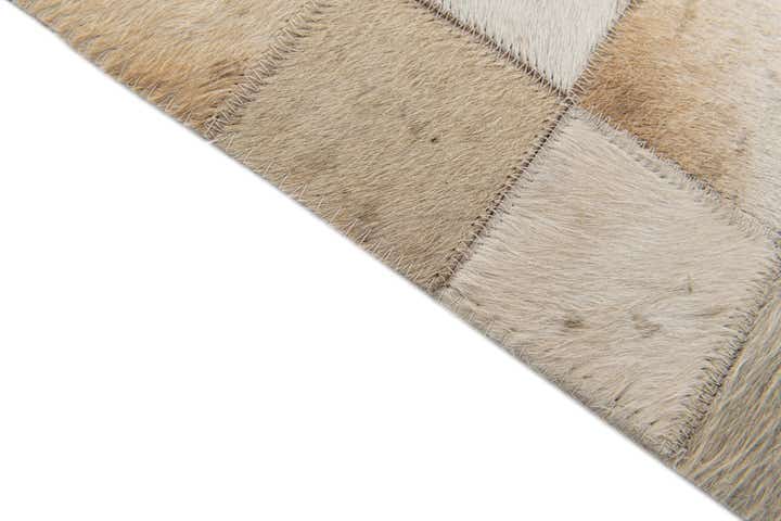 4' 11 x 7' 10 Cowhide Stocks Rug