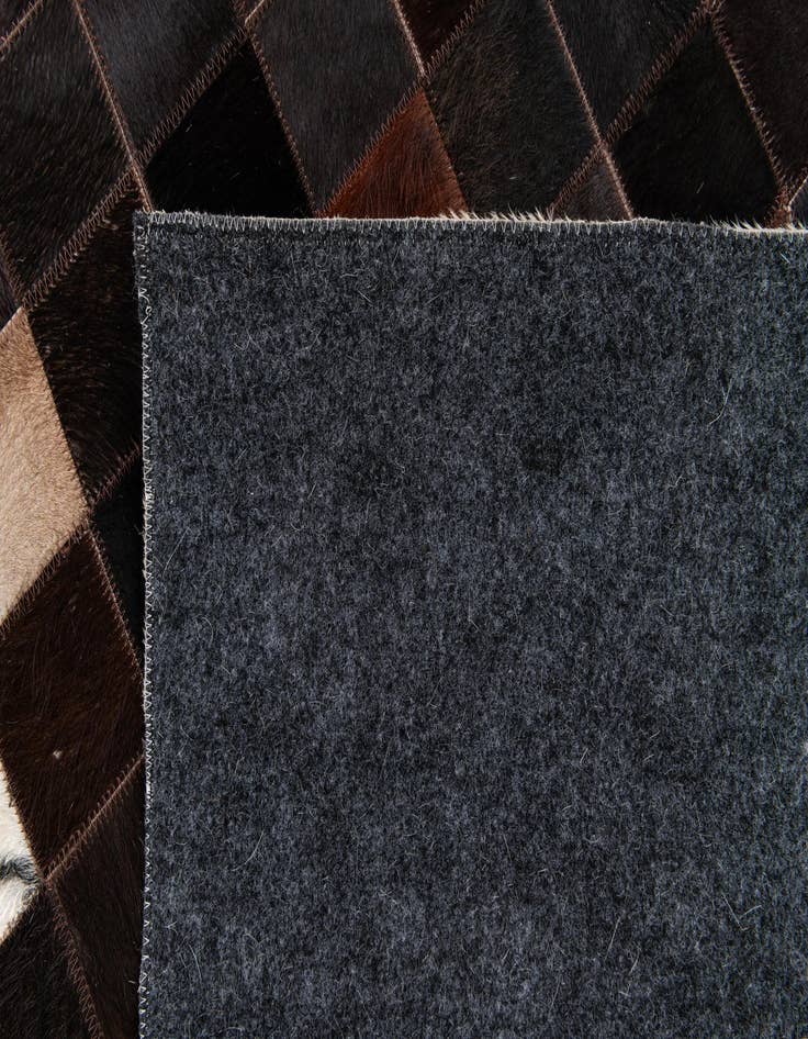 Detail image of 4' 11 x 7' 10 Cowhide Stocks Rug