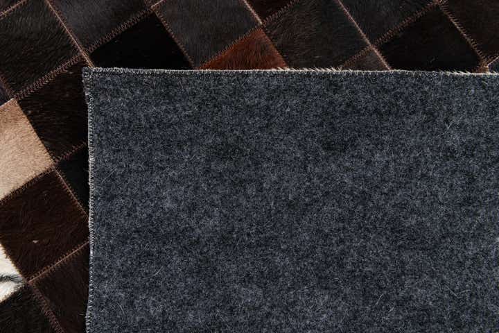 4' 11 x 7' 10 Cowhide Stocks Rug