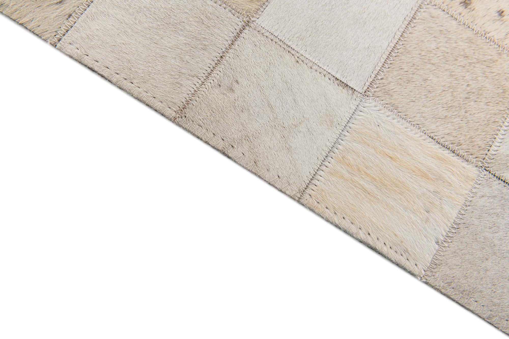 4' 11 x 7' 10 Cowhide Stocks Rug