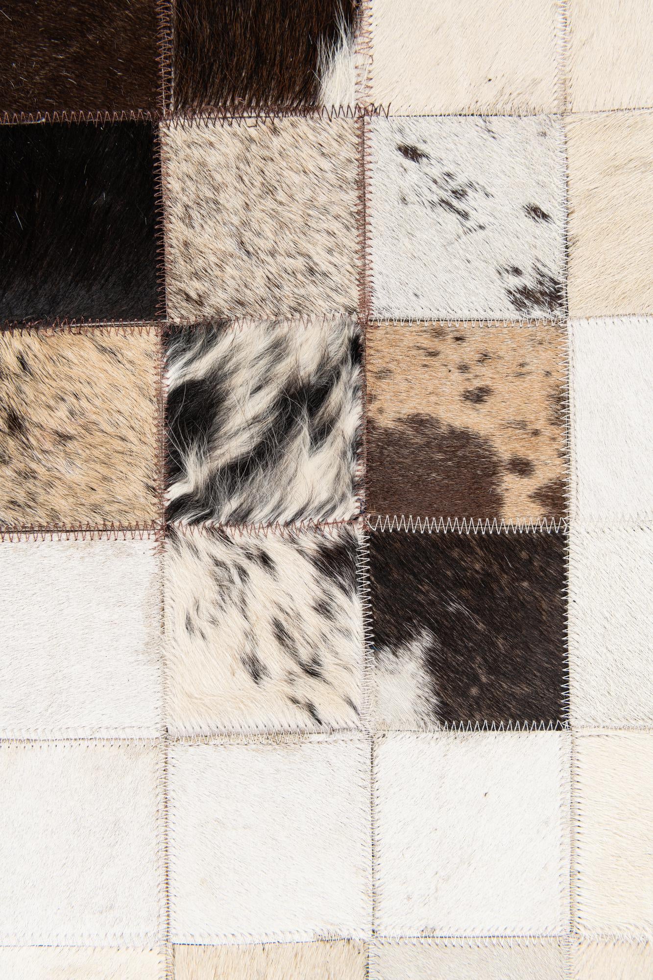 4' 11 x 7' 10 Cowhide Stocks Rug