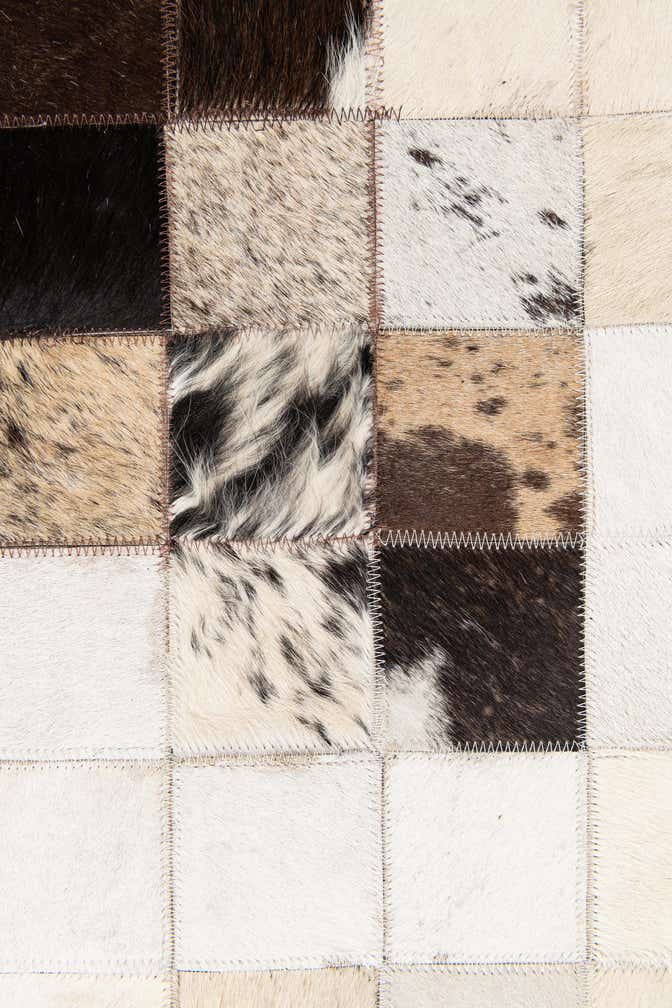 4' 11 x 7' 10 Cowhide Stocks Rug