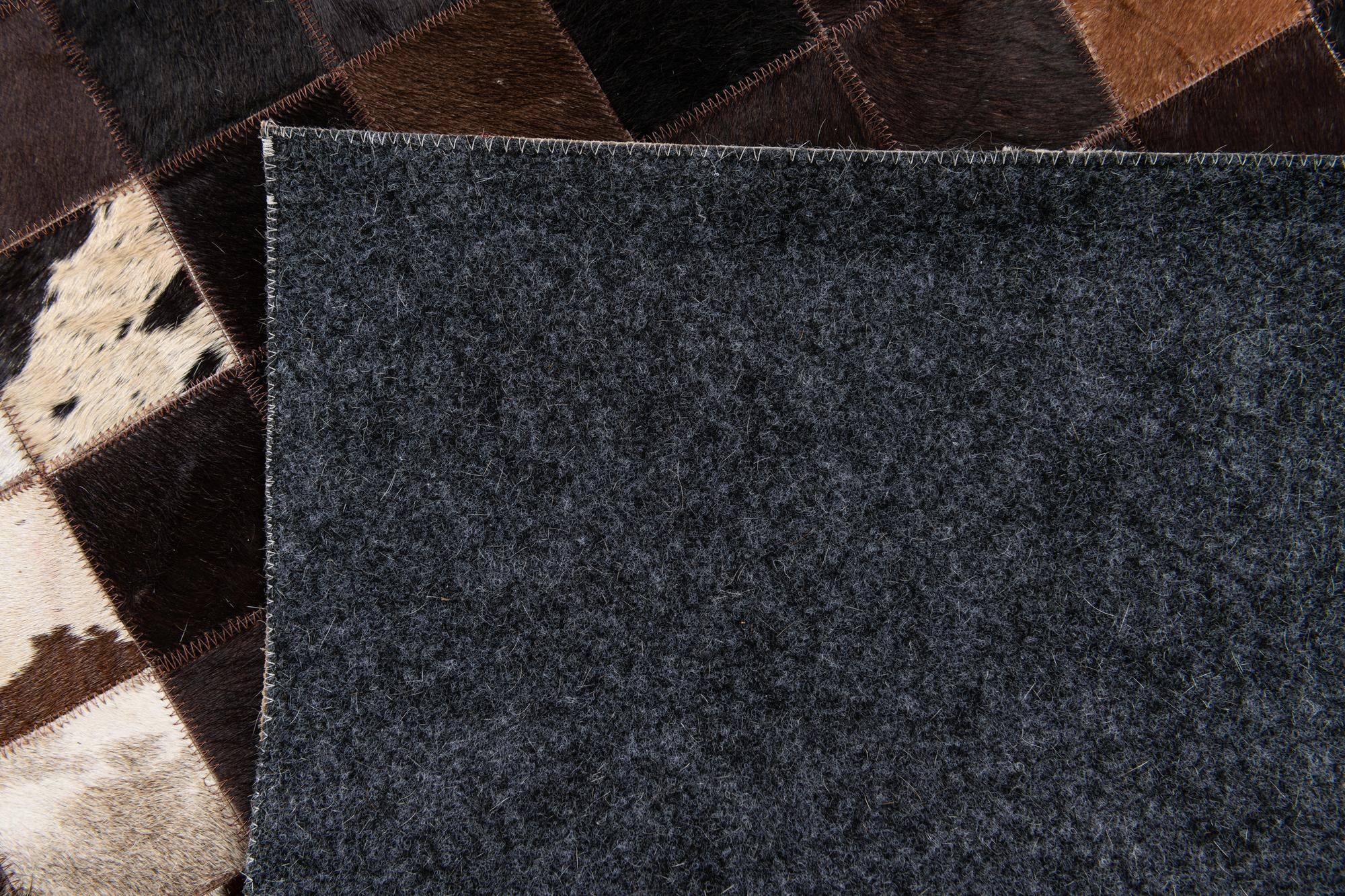 4' 11 x 7' 10 Cowhide Stocks Rug