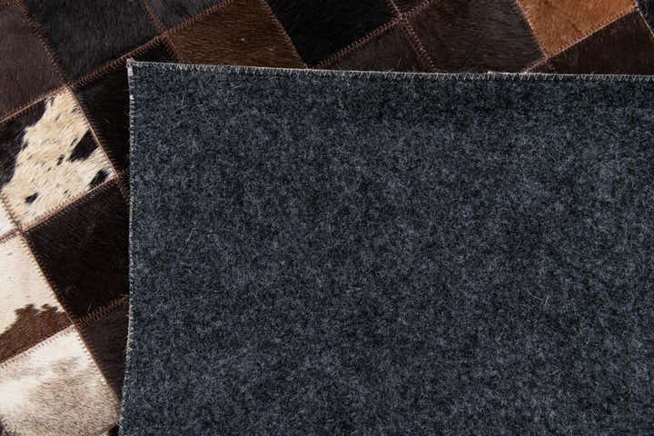 4' 11 x 7' 10 Cowhide Stocks Rug