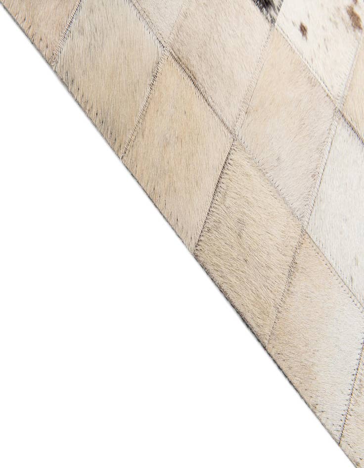 Detail image of 5' x 7' 10 Cowhide Stocks Rug