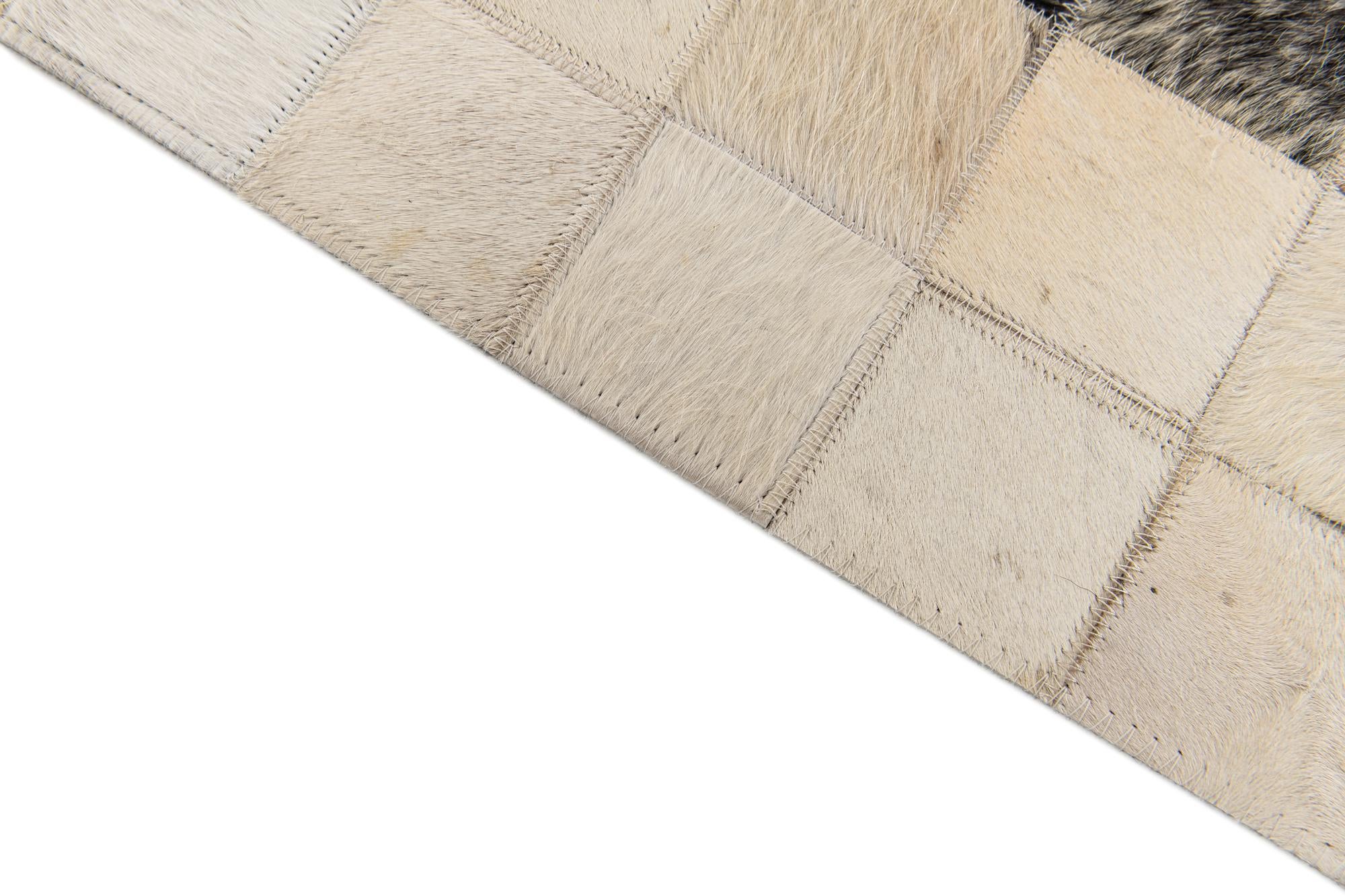 4' 11 x 7' 10 Cowhide Stocks Rug