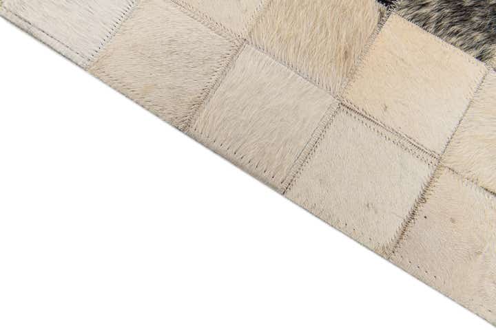 4' 11 x 7' 10 Cowhide Stocks Rug