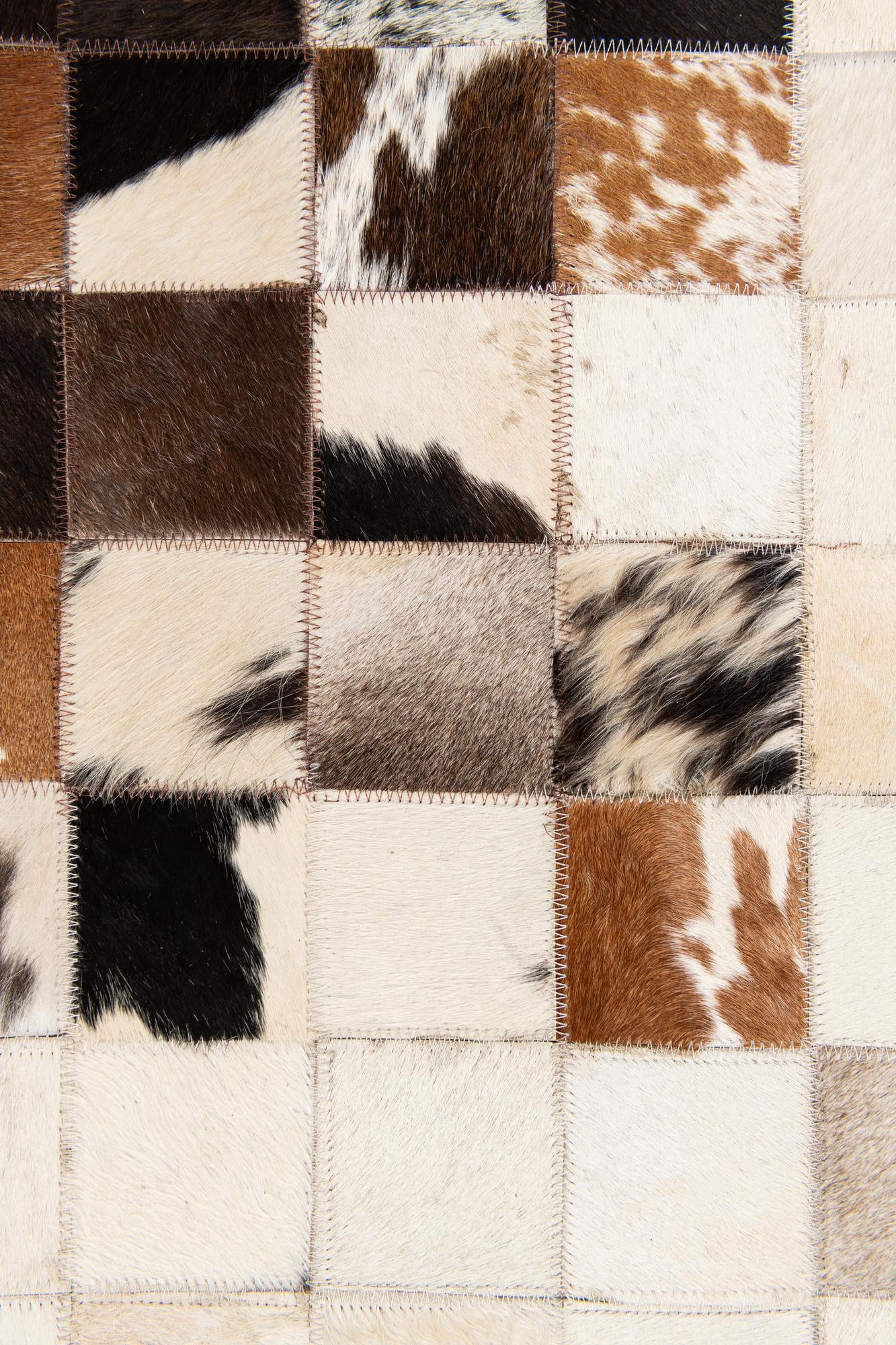 4' 11 x 7' 10 Cowhide Stocks Rug