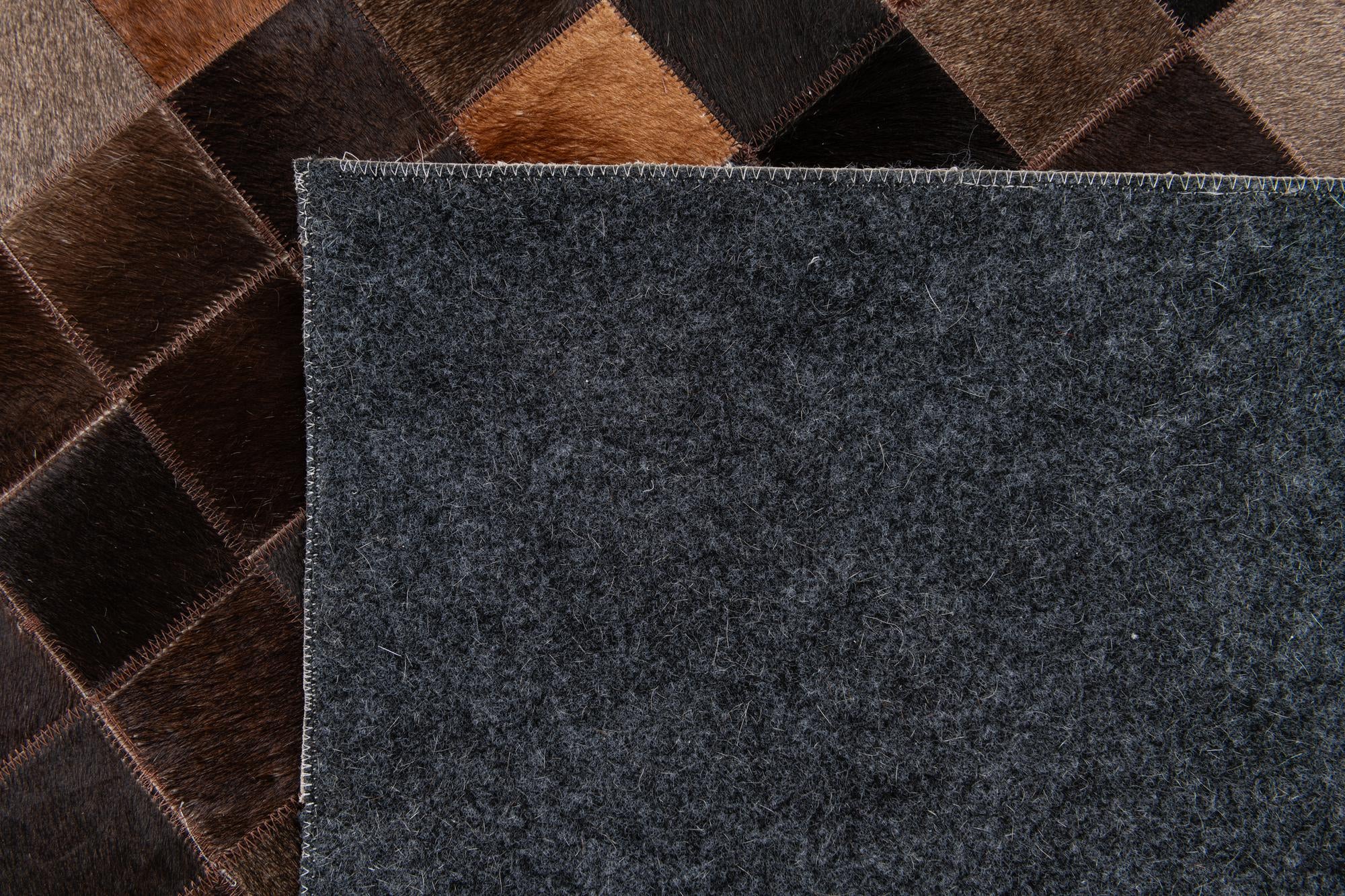 4' 11 x 7' 10 Cowhide Stocks Rug