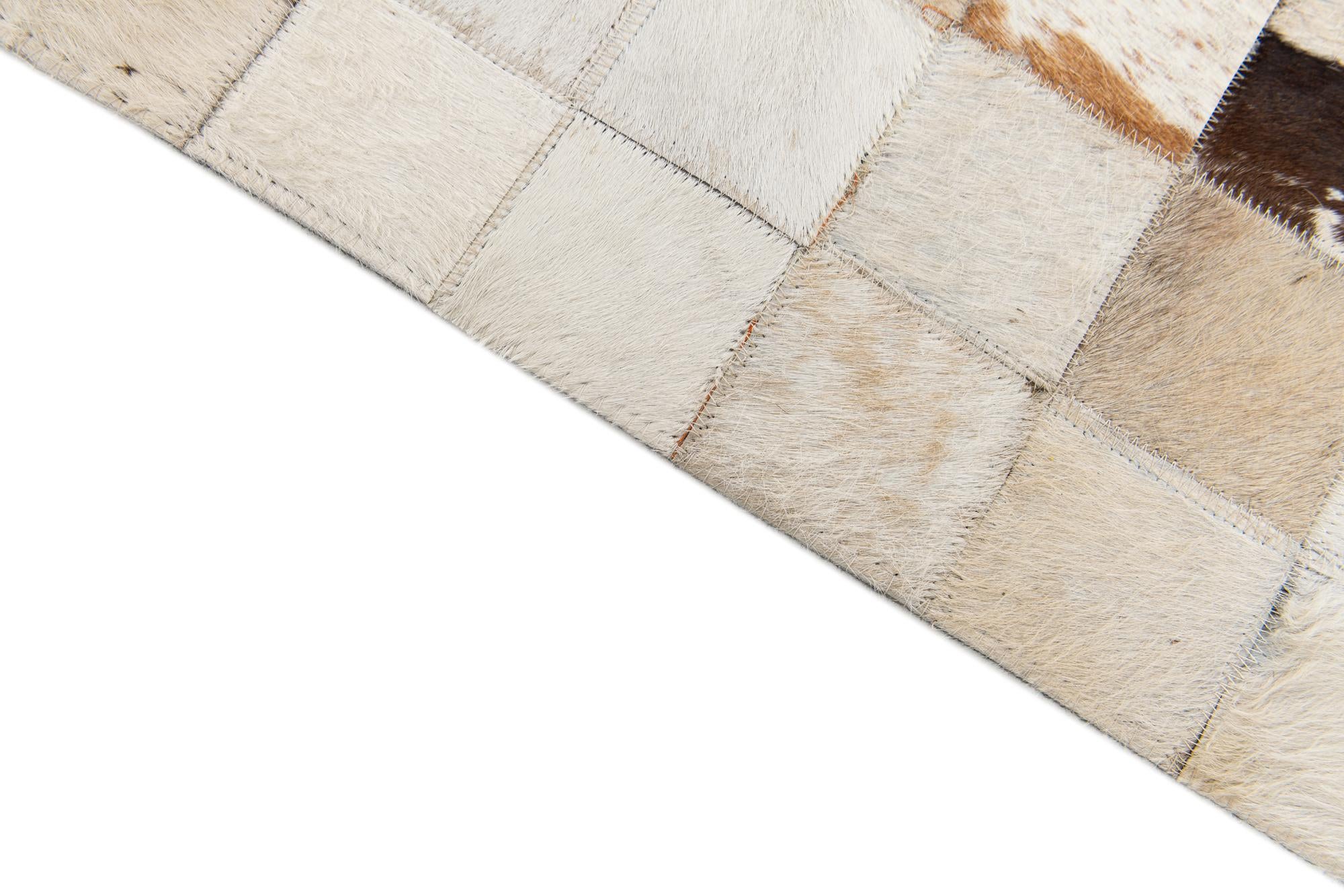 5' 2 x 8' Cowhide Stocks Rug