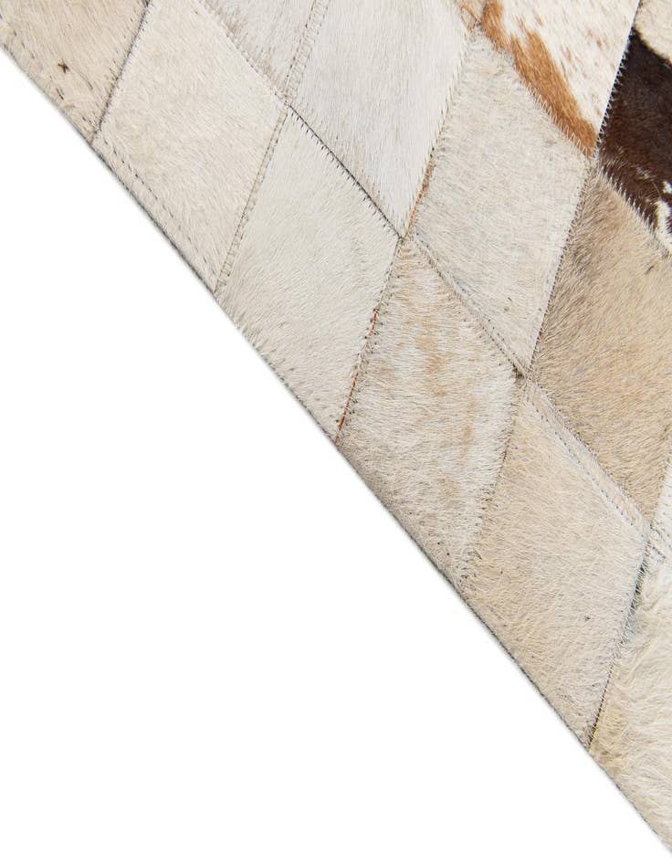 Detail image of 5' 2 x 8' Cowhide Stocks Rug