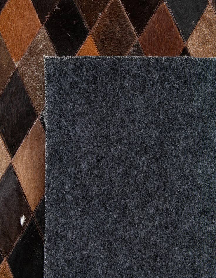 Detail image of 5' 2 x 8' Cowhide Stocks Rug