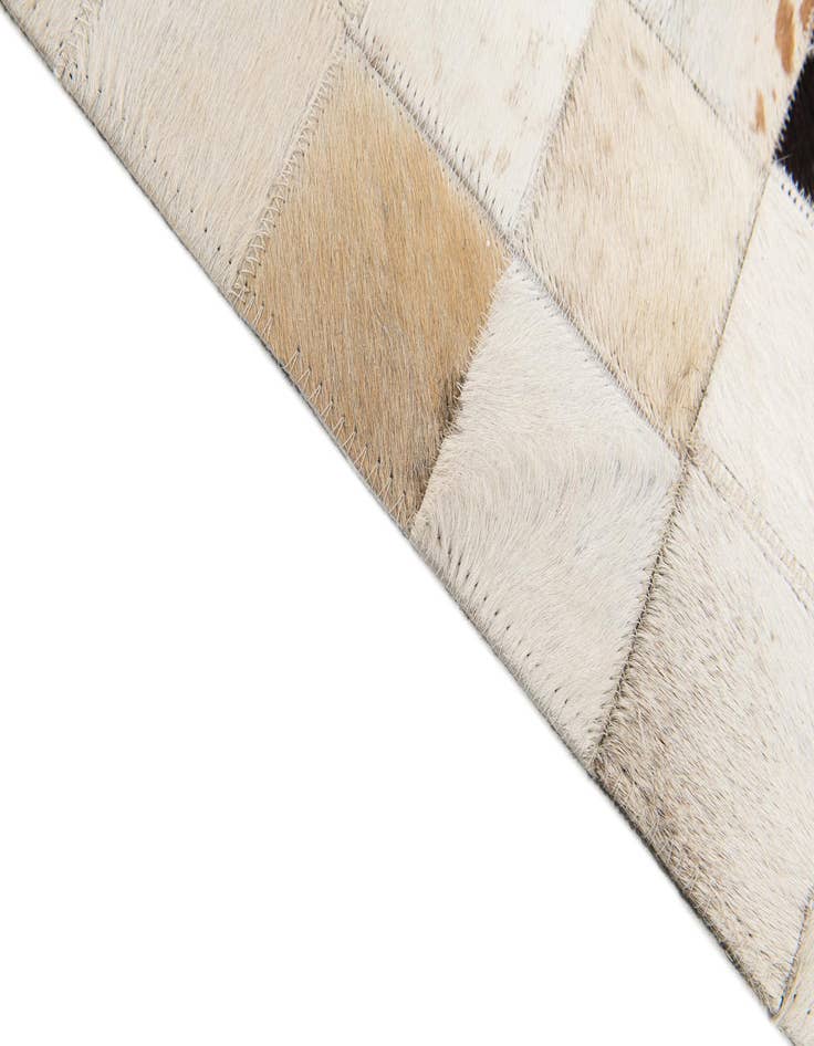 Detail image of 5' x 7' 11 Cowhide Stocks Rug