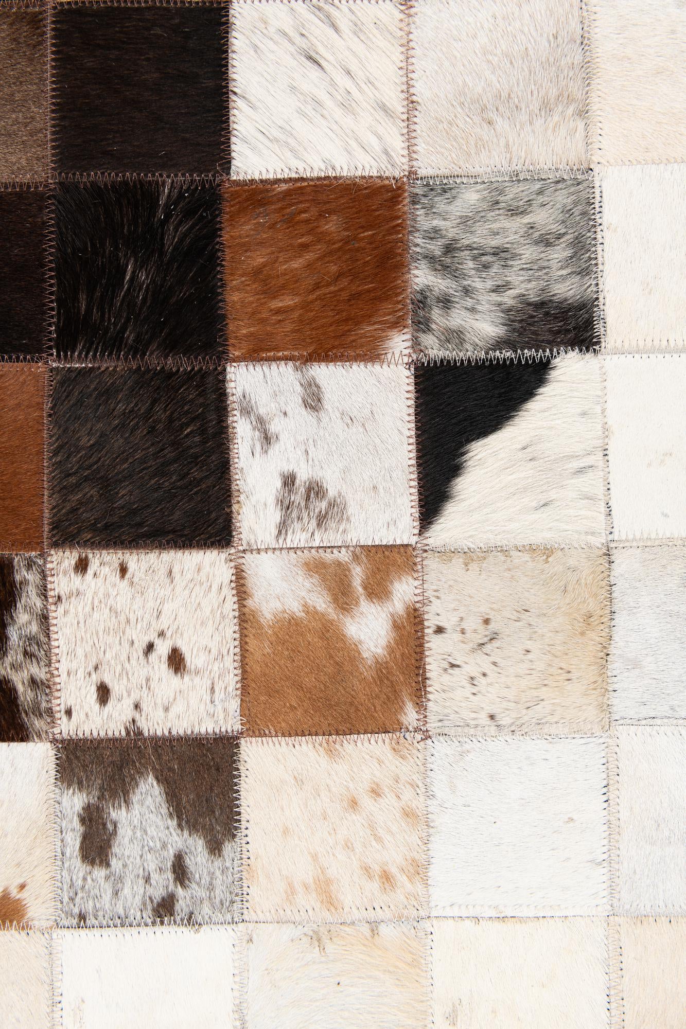 5' x 7' 11 Cowhide Stocks Rug