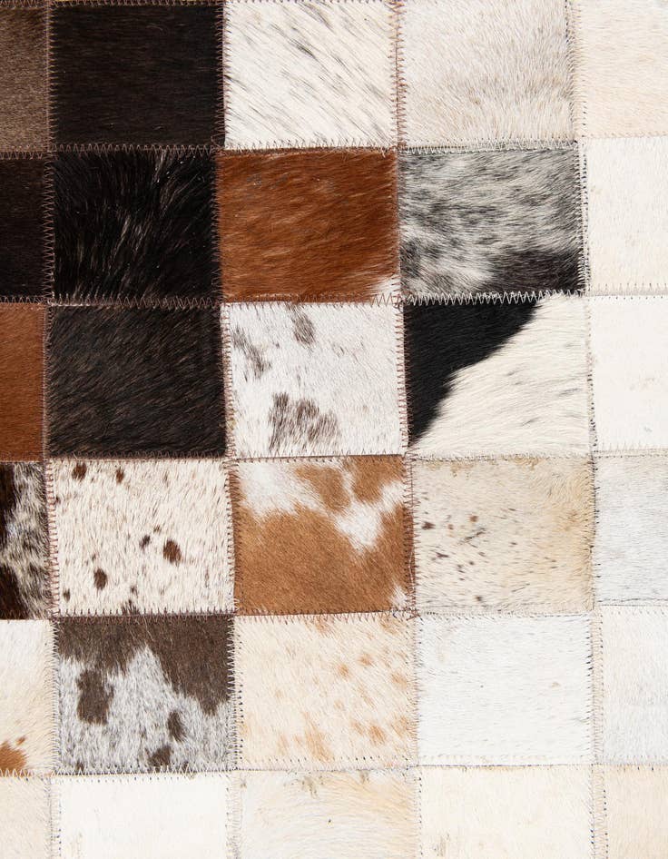 Detail image of 5' x 7' 11 Cowhide Stocks Rug