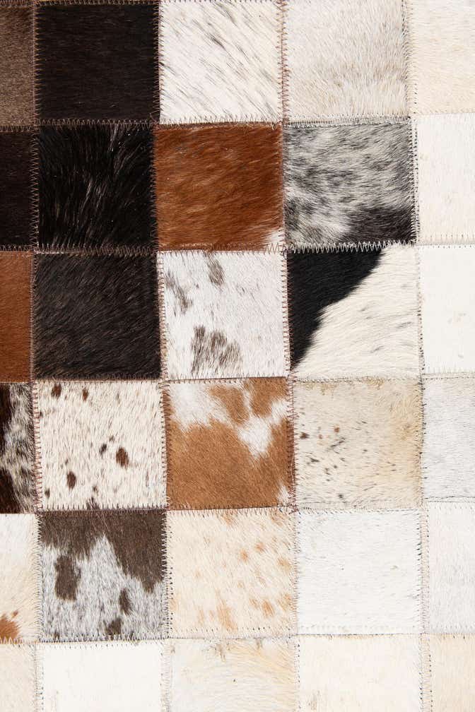 5' x 7' 11 Cowhide Stocks Rug