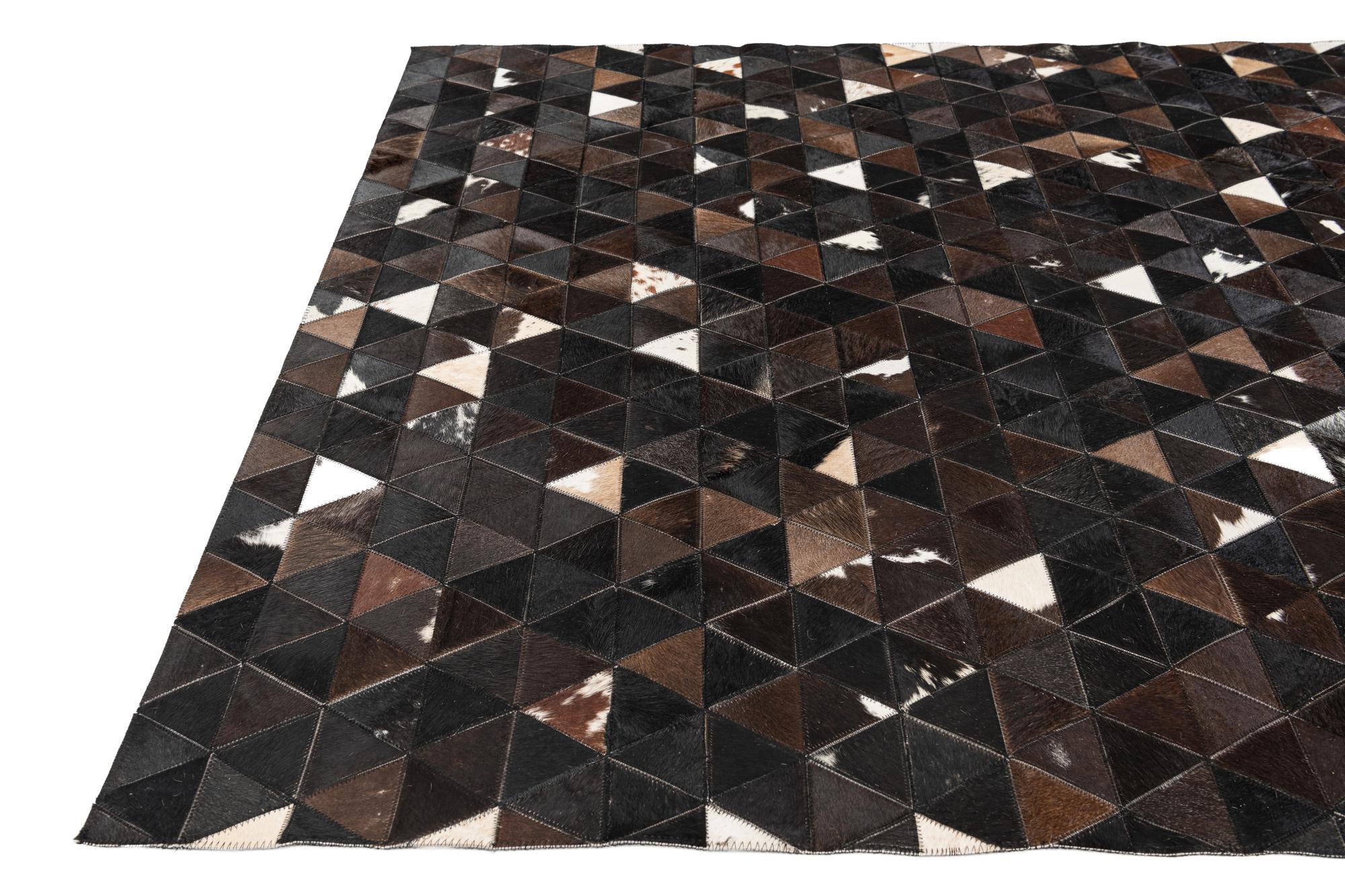 5' 1 x 8' Cowhide Stocks Rug