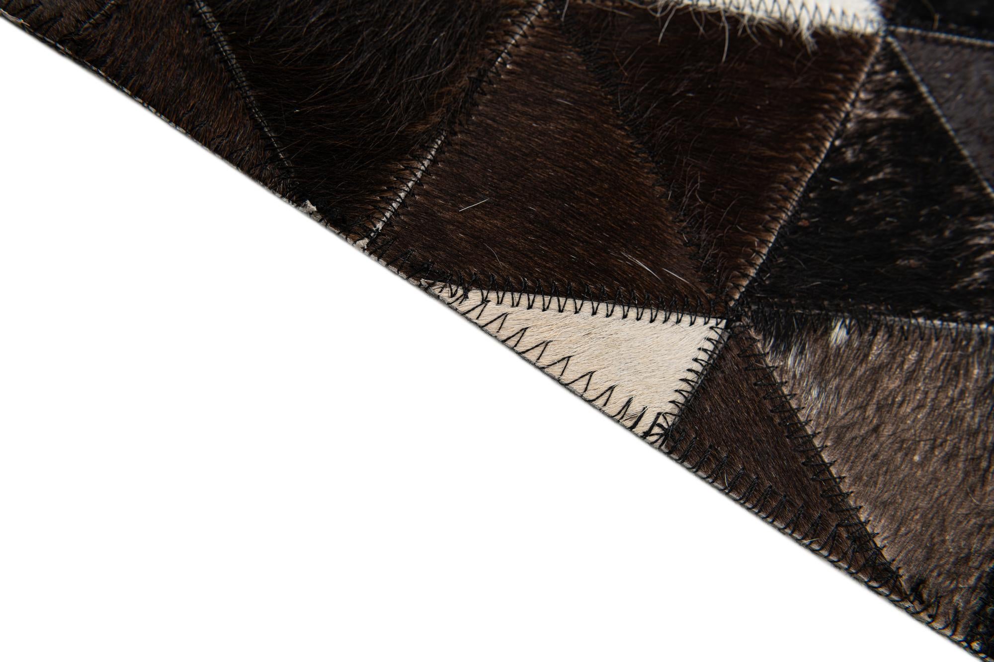 5' 1 x 8' Cowhide Stocks Rug