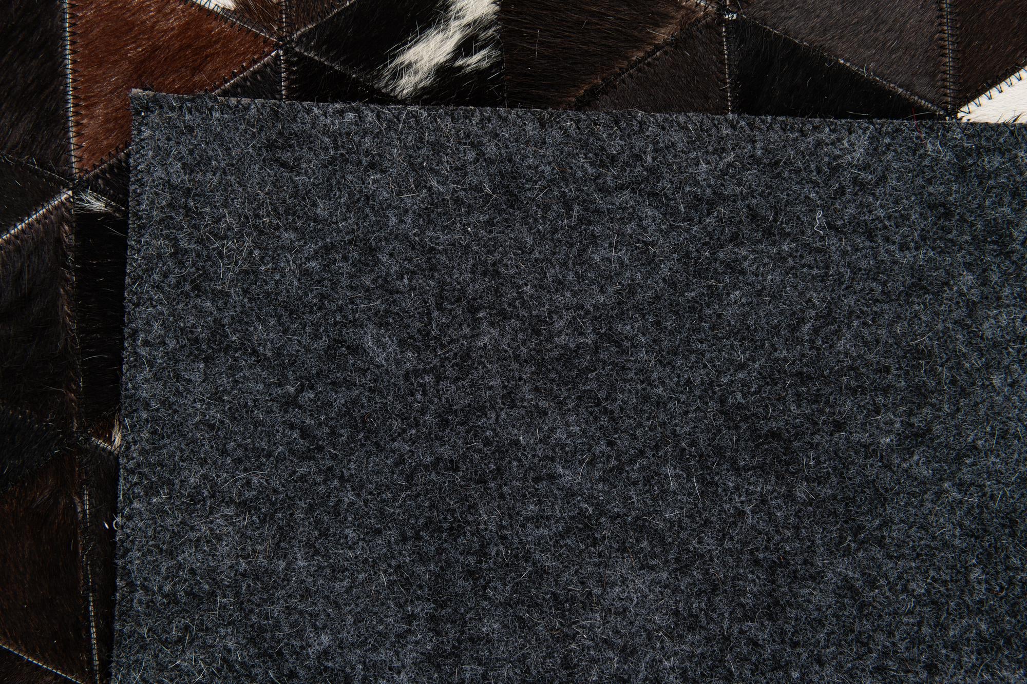 5' 1 x 8' Cowhide Stocks Rug