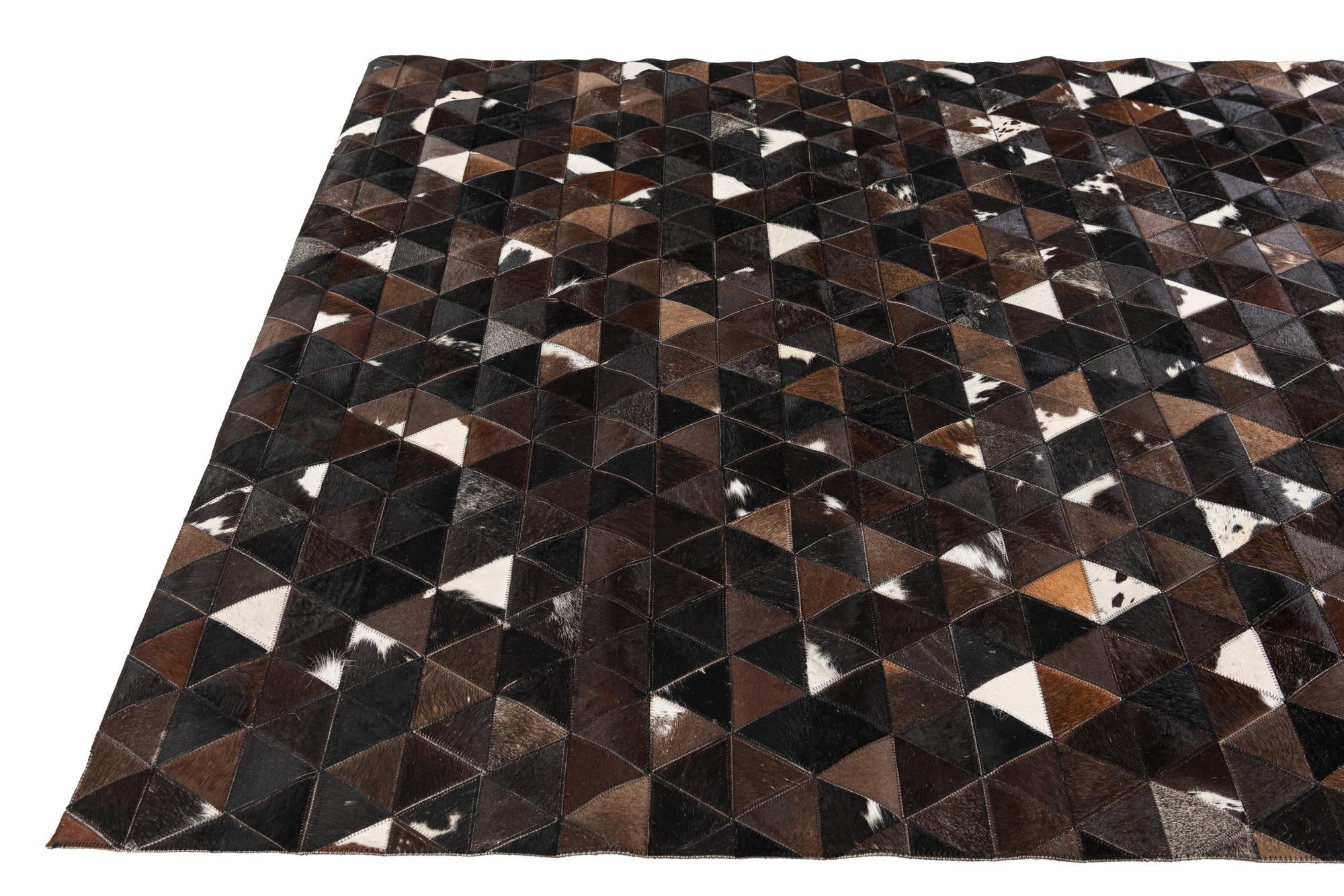 5' x 7' 9 Cowhide Stocks Rug