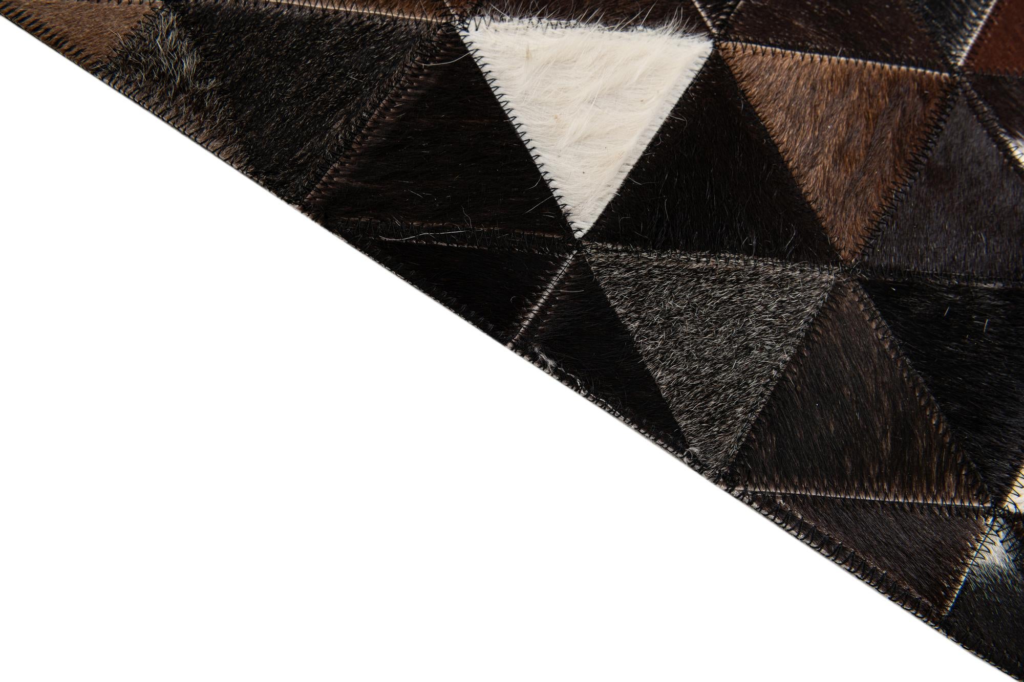 5' x 7' 9 Cowhide Stocks Rug