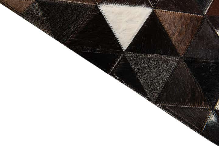5' x 7' 9 Cowhide Stocks Rug