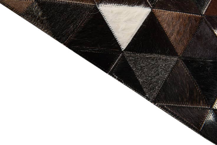Detail image of 5' x 7' 9 Cowhide Stocks Rug