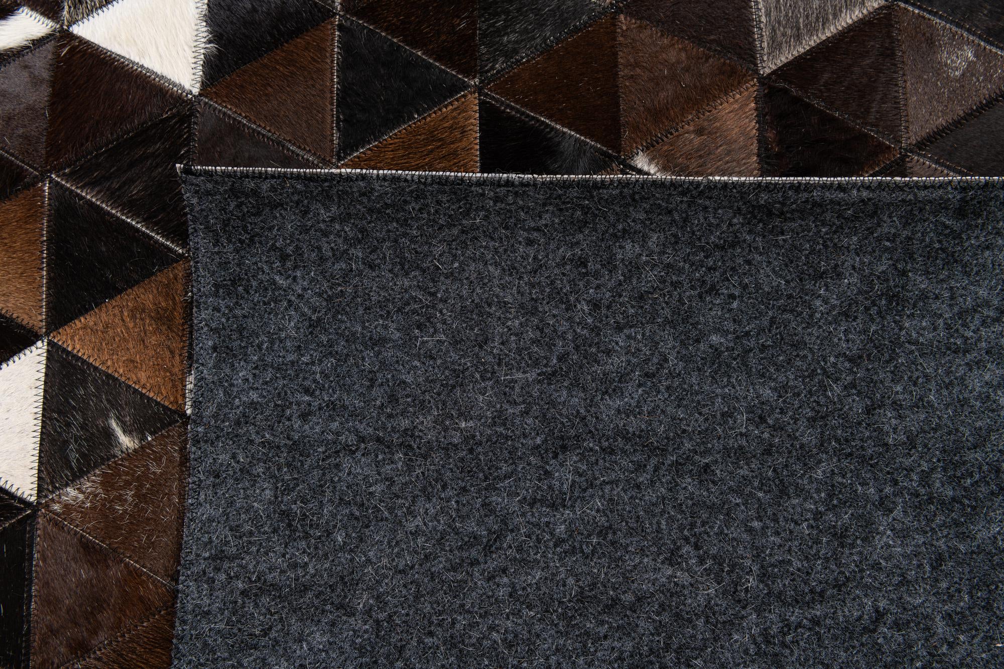 5' x 7' 9 Cowhide Stocks Rug