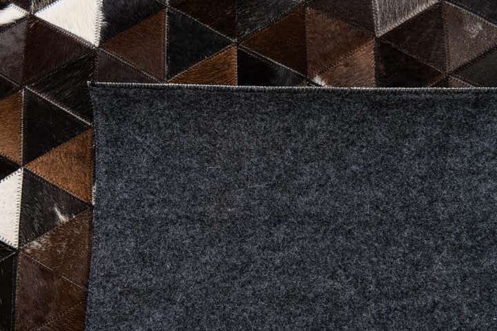 5' x 7' 9 Cowhide Stocks Rug