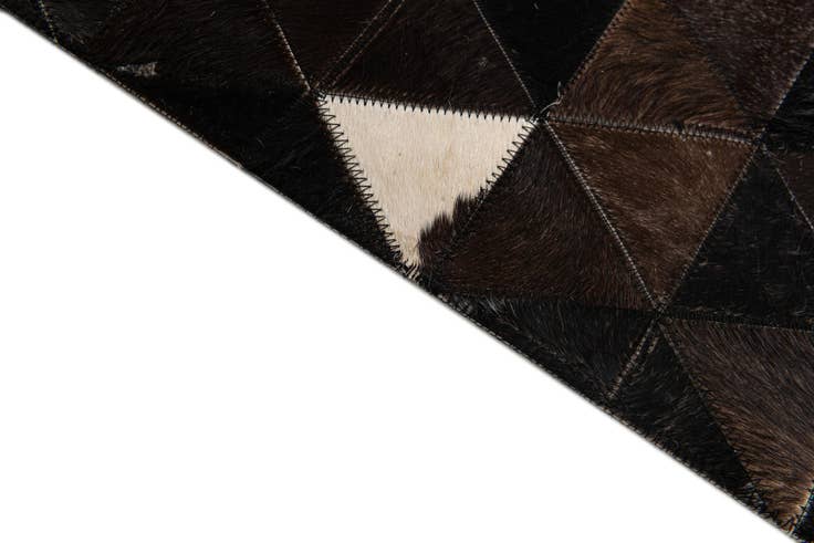 Detail image of 5' 1 x 7' 11 Cowhide Stocks Rug