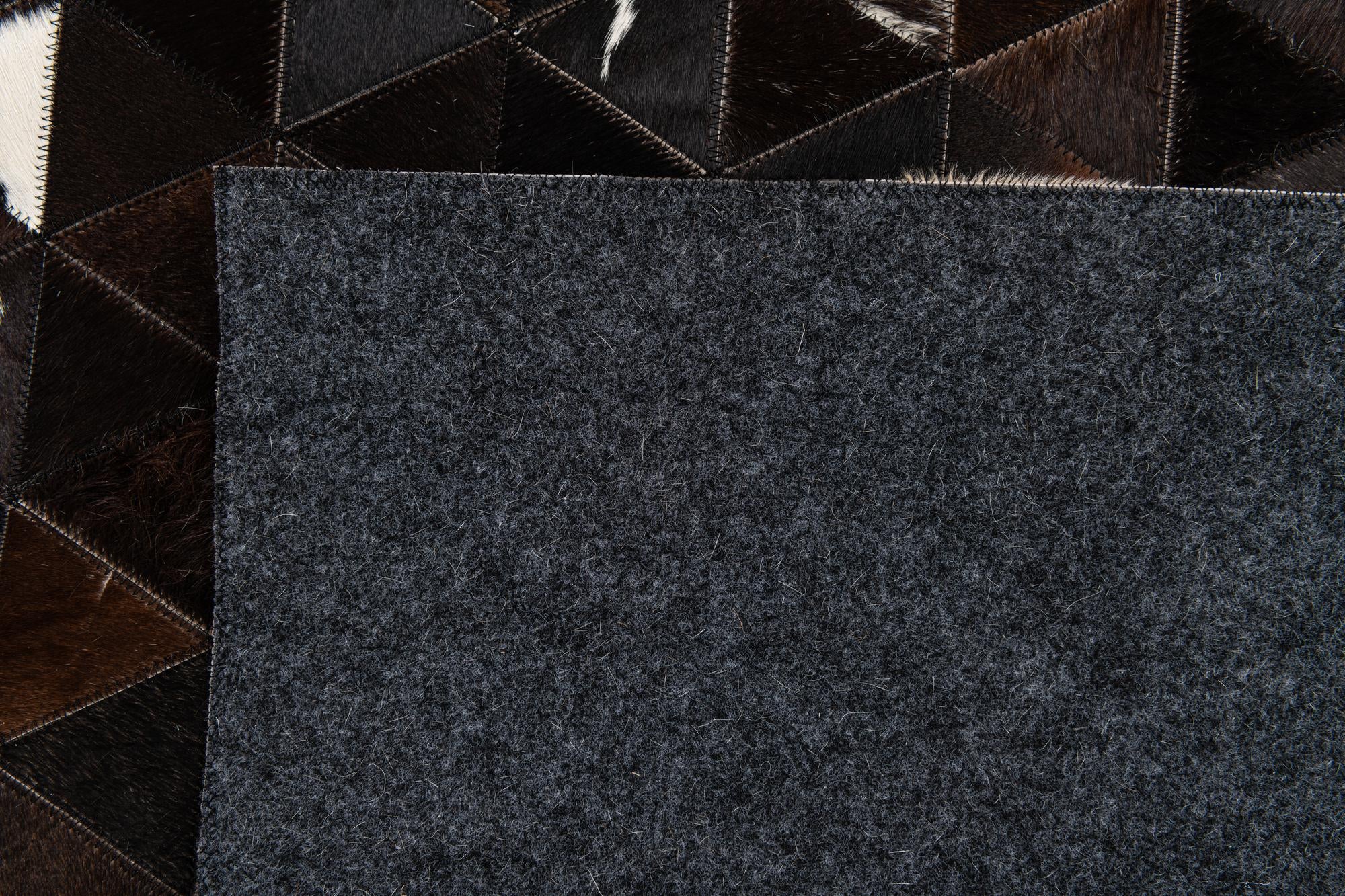 5' 1 x 7' 11 Cowhide Stocks Rug