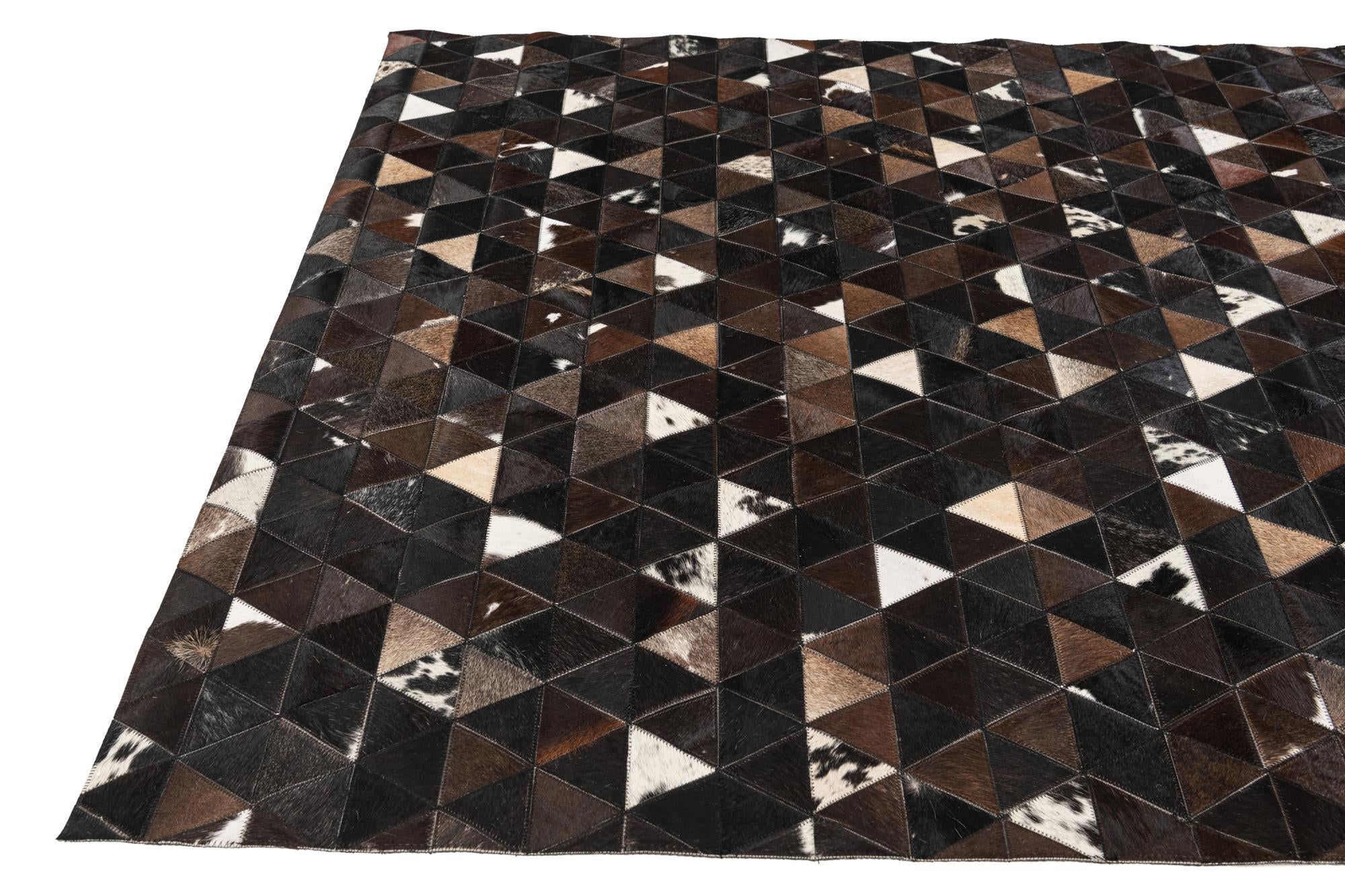 5' x 7' 11 Cowhide Stocks Rug