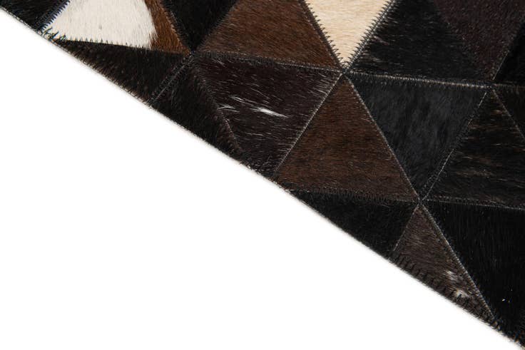 Detail image of 5' 1 x 8' Cowhide Stocks Rug