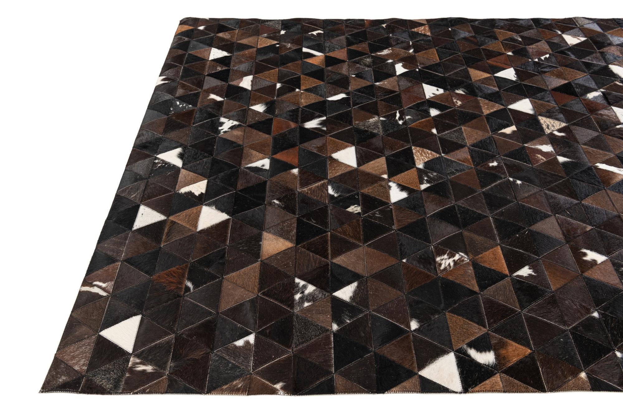 4' 11 x 7' 10 Cowhide Stocks Rug