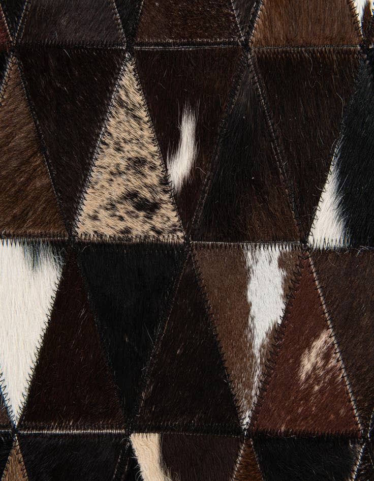 Detail image of 4' 11 x 7' 10 Cowhide Stocks Rug
