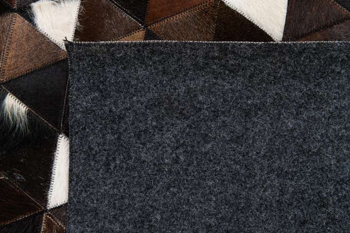 4' 11 x 7' 10 Cowhide Stocks Rug